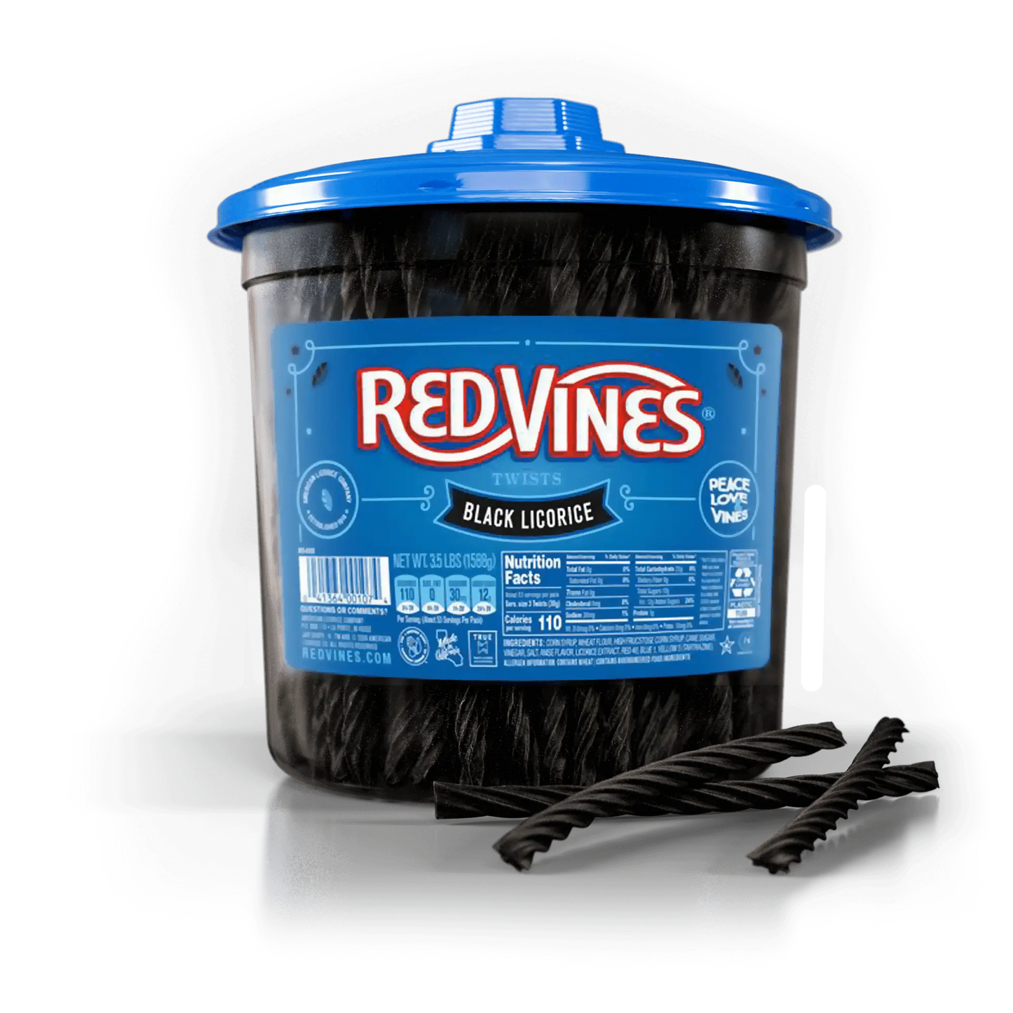 Red Vines black licorice in a bulk jar with black licorice pieces laying in front