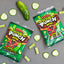 SOUR PUNCH Pickle Roulette Bites with roulette game pieces and real pickles