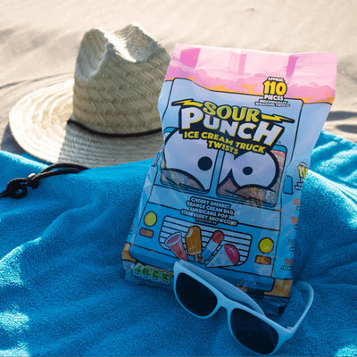 SOUR PUNCH Ice Cream Truck Twists ice cream candy on a beach towel at the beach