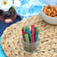 Sour Punch 3" Twists unwrapped in a Jar next to other snacks