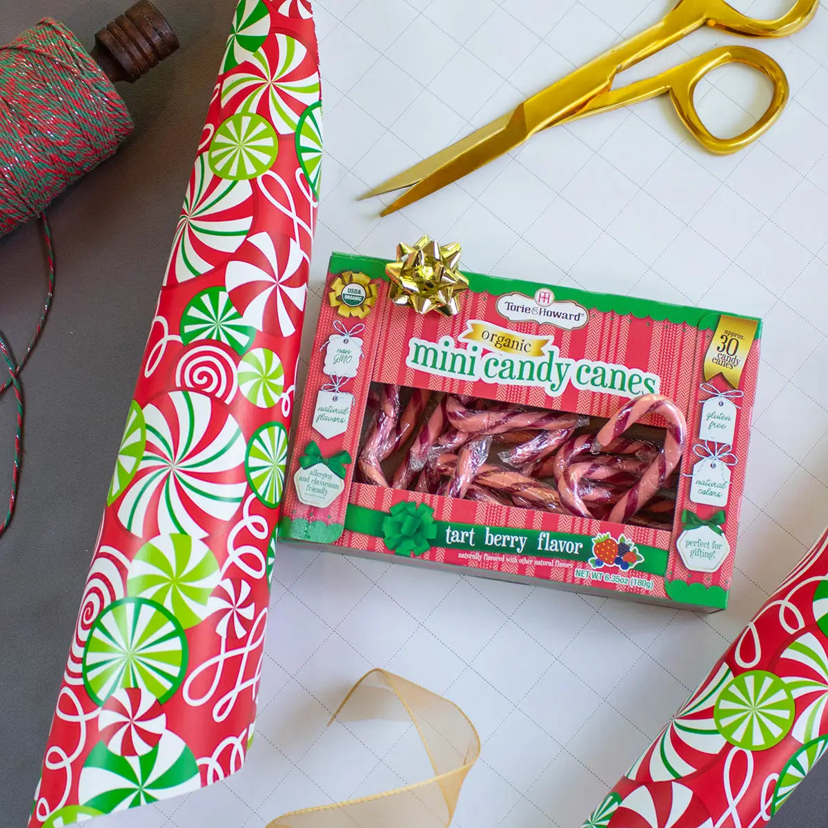 Torie & Howard Organic Candy Canes on wrapping paper