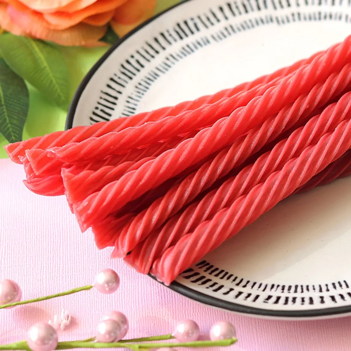 Made Simple Berry Licorice Twists on a spring time platter