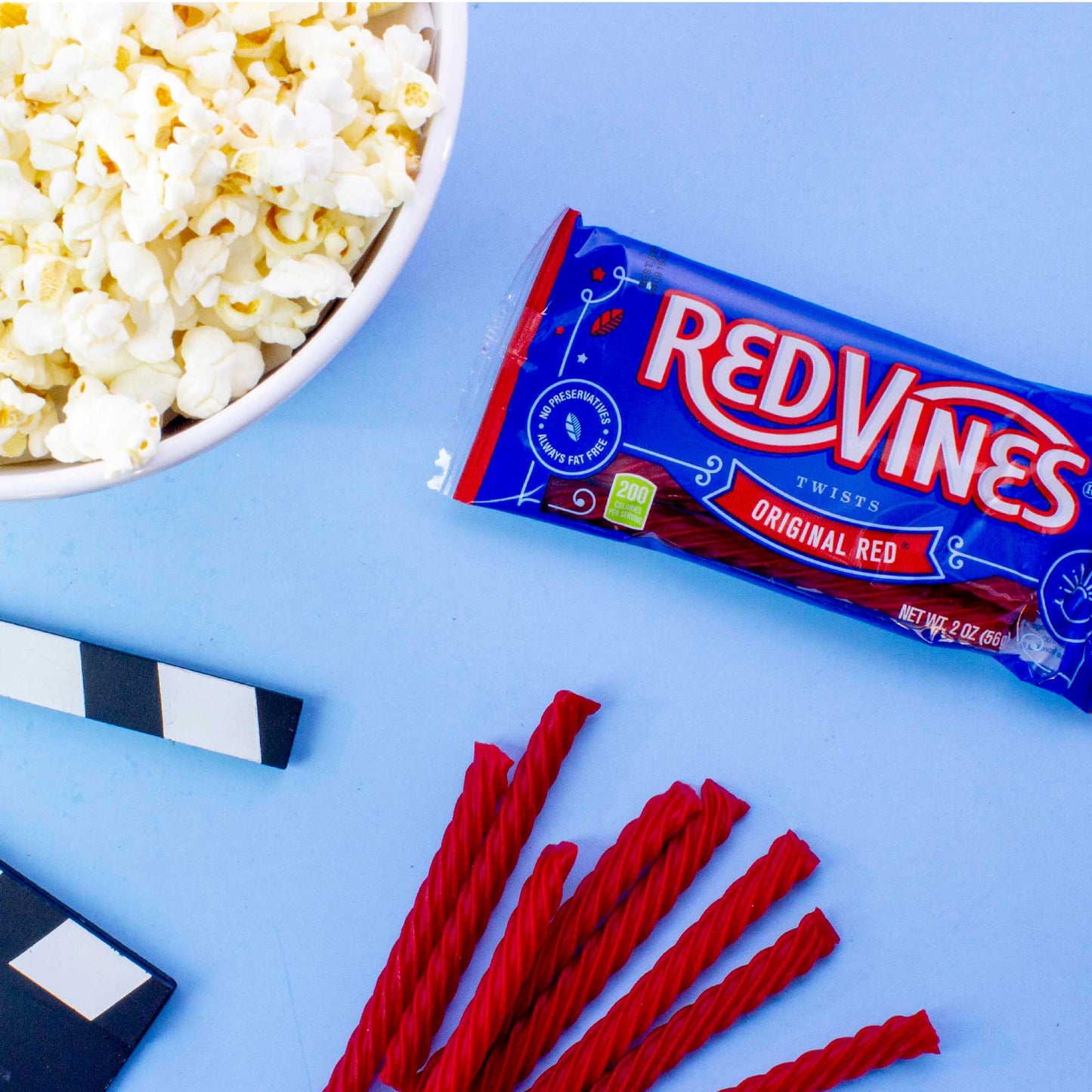 Red Vines Original Red Chewy Licorice Twists 2oz Bag with popcorn