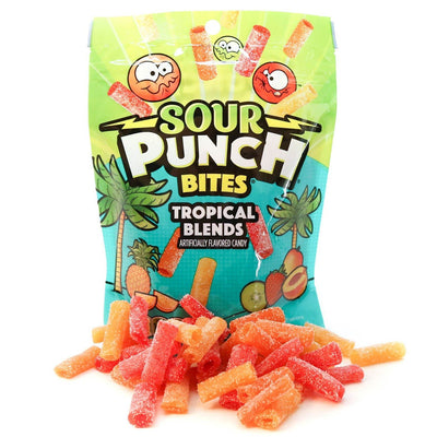 Variety of tropical flavored sour bites in front of Sour Punch stand up bag