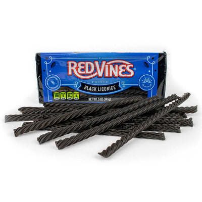 Black Licorice candy in front of 5oz Red Vines Movie Tray