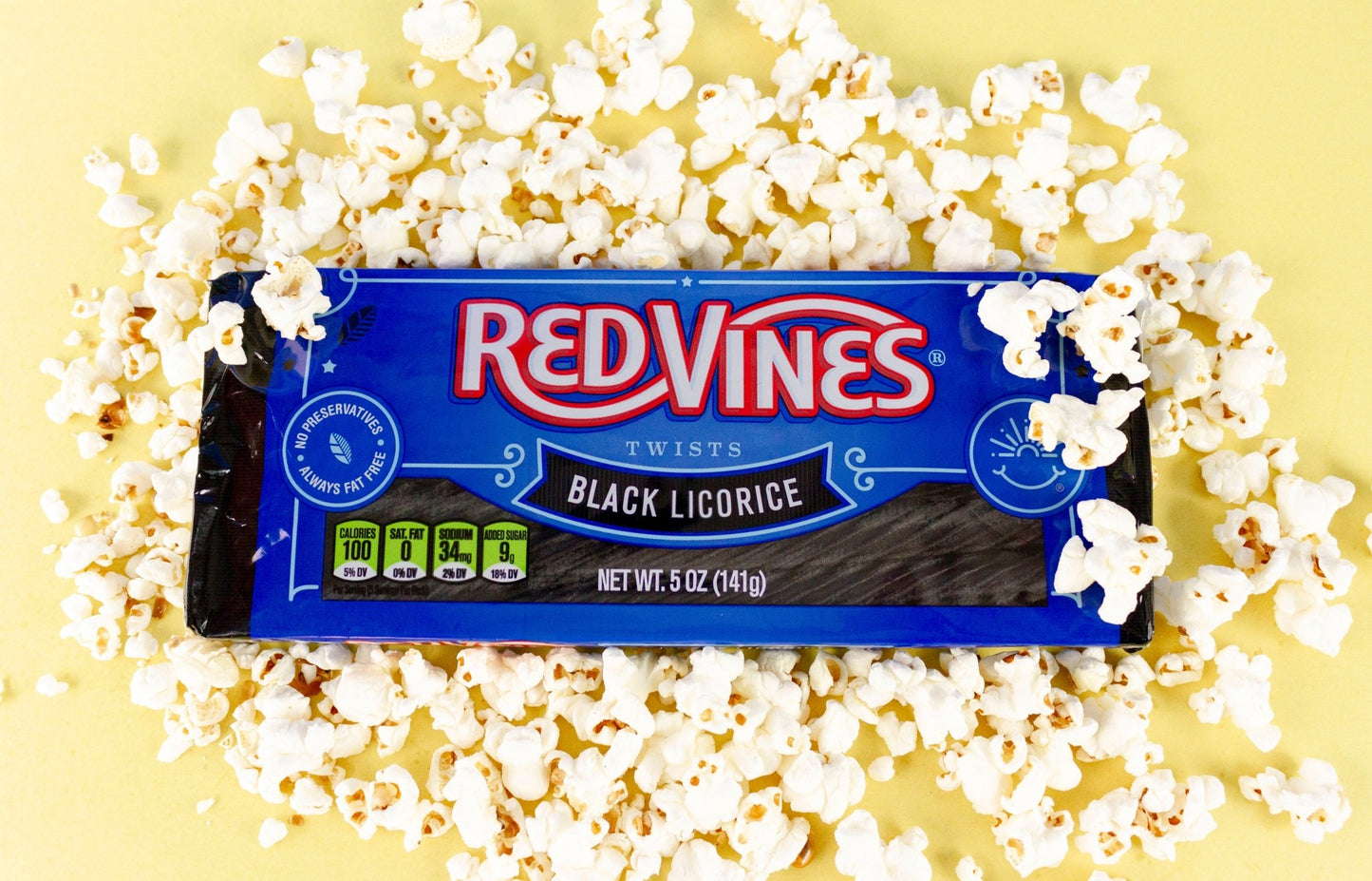 Red Vines Black Licorice Twists tray swimming in popcorn