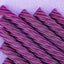 Chewy Grape Purple Licorice Twists with a light purple background