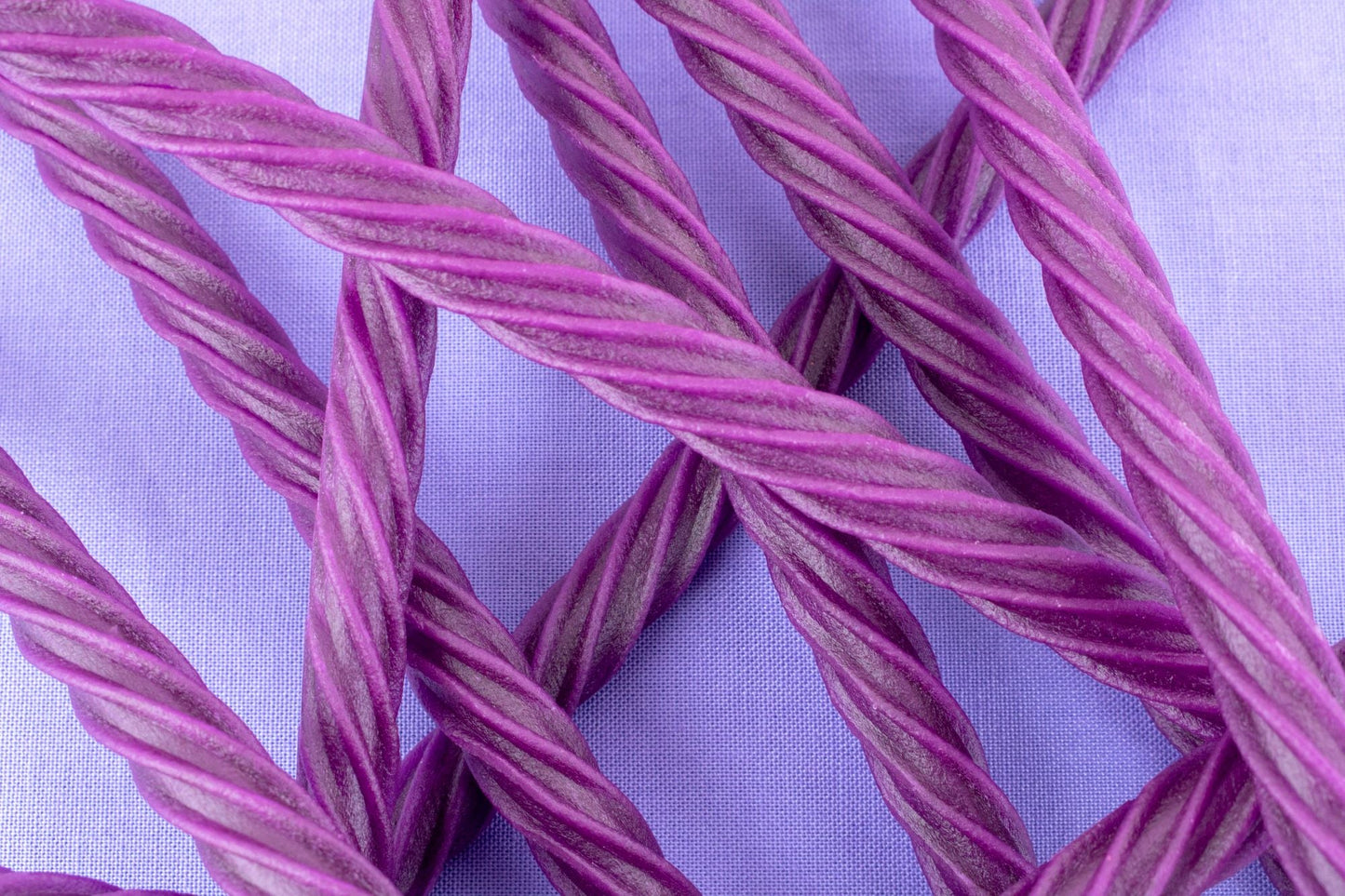 Chewy Grape Purple Licorice Twists in a pile
