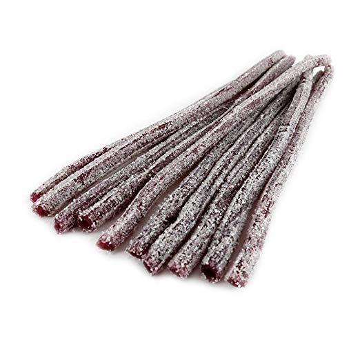 Bulk Sour Candy Grape Straws in a pile