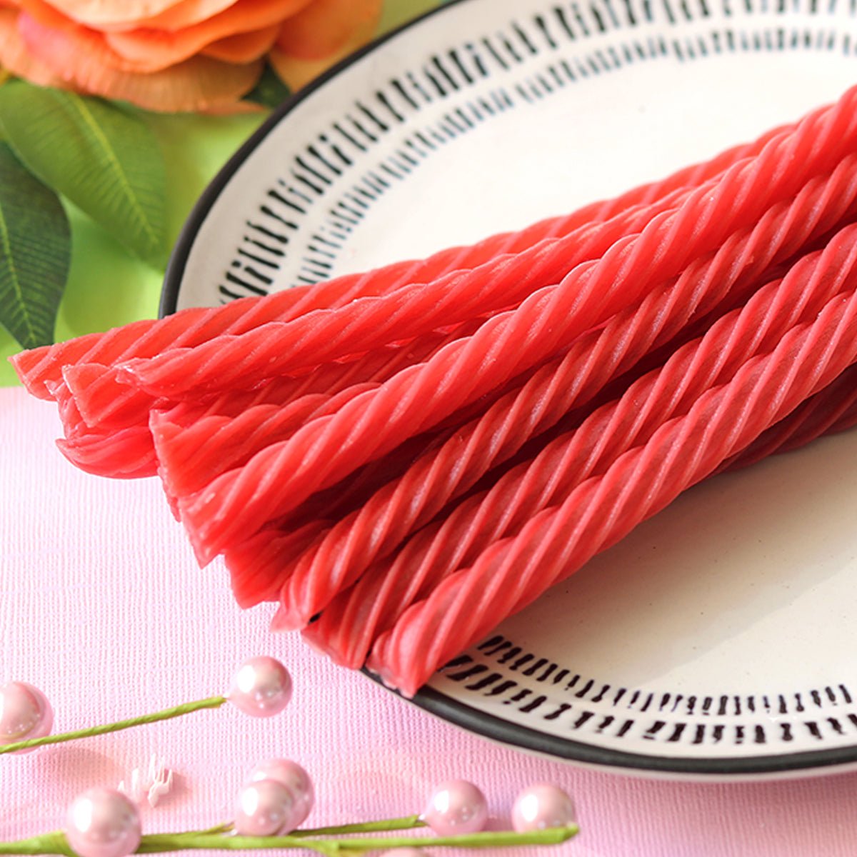 Made Simple Berry Licorice Twists on a spring time platter
