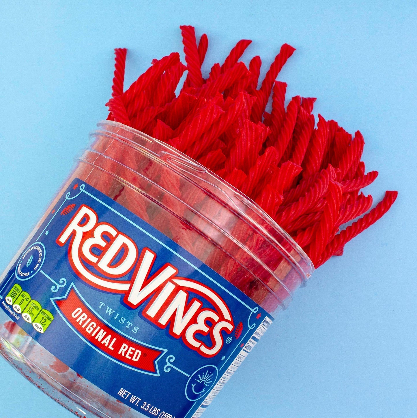 Red Vines Original Red Licorice Twists 3.5lb Jar with candy falling out