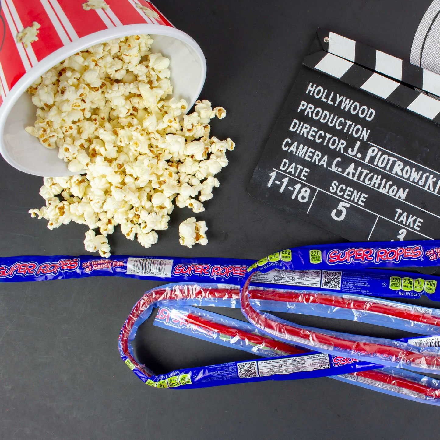 SUPER ROPES with popcorn and movie clapboard