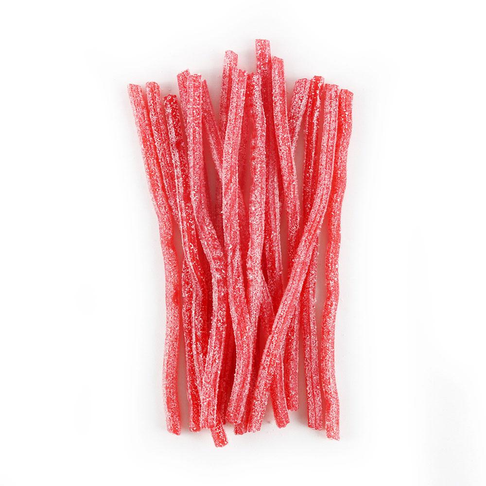 Strawberry bulk sour candy straws in a pile